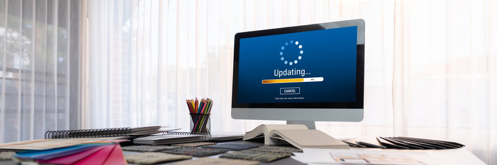 Image of a computer with the word upgrade on the screen